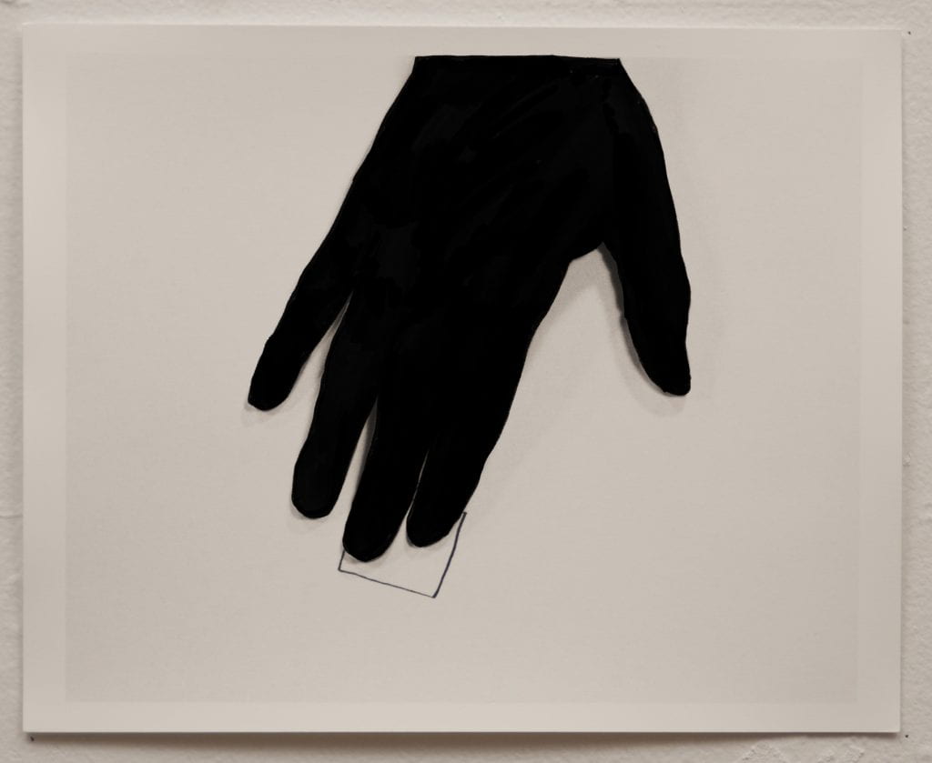 A black outline of a hand , palm facing down, on paper. A part of a square is drawn on the paper.